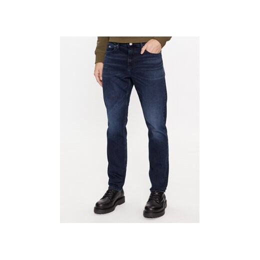 Tommy Jeans Jeansy Scanton DM0DM17438 Granatowy Slim Fit ze sklepu MODIVO w kategorii Jeansy męskie - zdjęcie 168679342