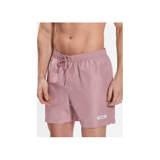 Calvin Klein Swimwear Szorty kąpielowe Medium Drawstring KM0KM00812 Różowy Regular Fit ze sklepu MODIVO w kategorii Kąpielówki - zdjęcie 168680820