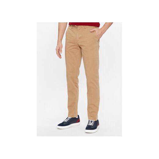 Tommy Hilfiger Spodnie materiałowe Hampton MW0MW32568 Beżowy Slim Fit ze sklepu MODIVO w kategorii Spodnie męskie - zdjęcie 168680850