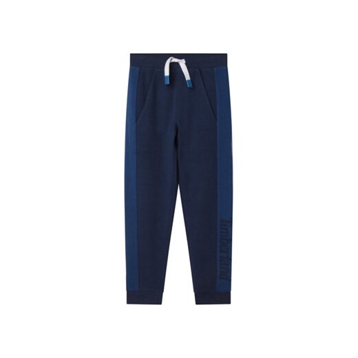 Timberland Spodnie dresowe T24C36 S Niebieski Regular Fit ze sklepu MODIVO w kategorii Spodnie chłopięce - zdjęcie 168687534