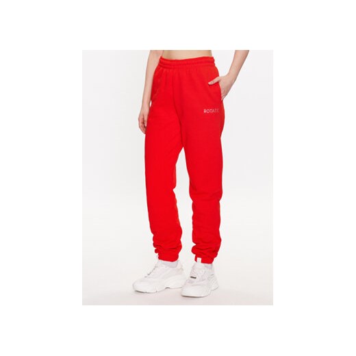 ROTATE Spodnie dresowe Mimi 7001571030 Czerwony Relaxed Fit ze sklepu MODIVO w kategorii Spodnie damskie - zdjęcie 168693672