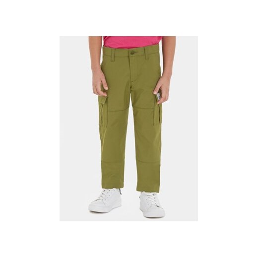 Tommy Hilfiger Spodnie materiałowe KB0KB08471 Zielony Regular Fit ze sklepu MODIVO w kategorii Spodnie chłopięce - zdjęcie 168697531