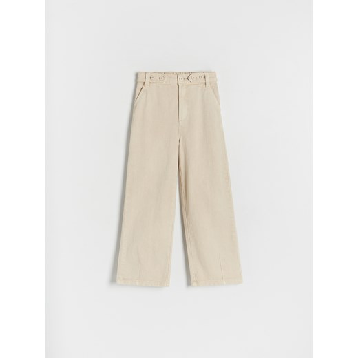 Reserved - Bawełniane spodnie z guzikami - kremowy ze sklepu Reserved w kategorii Spodnie dziewczęce - zdjęcie 168699274