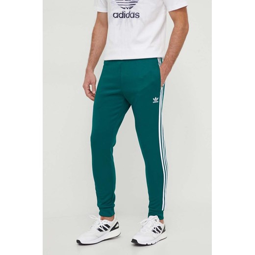 Spodnie męskie Adidas Originals z napisami 