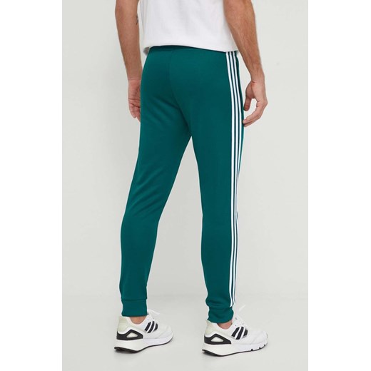 Spodnie męskie Adidas Originals z napisami 