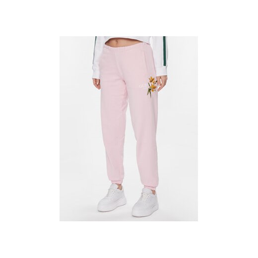 Guess Spodnie dresowe V4GB04 KC6V1 Różowy Regular Fit ze sklepu MODIVO w kategorii Spodnie damskie - zdjęcie 168746792