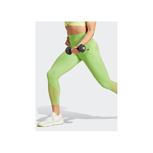 adidas Legginsy Tailored HIIT Training 7/8 Leggings IK4247 Zielony ze sklepu MODIVO w kategorii Spodnie damskie - zdjęcie 168792613