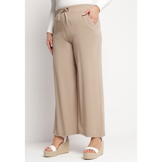 Ciemnobeżowe Bawełniane Spodnie Szerokie z Kieszeniami Hiveta ze sklepu Born2be Odzież w kategorii Spodnie damskie - zdjęcie 168842532