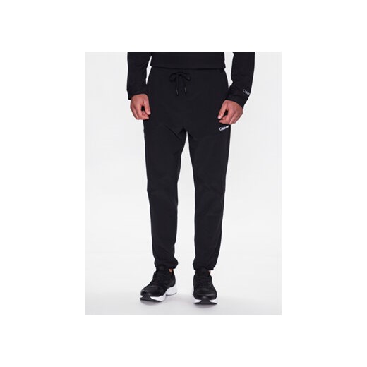 Calvin Klein Performance Spodnie dresowe 00GMS3P600 Czarny Regular Fit S okazja MODIVO
