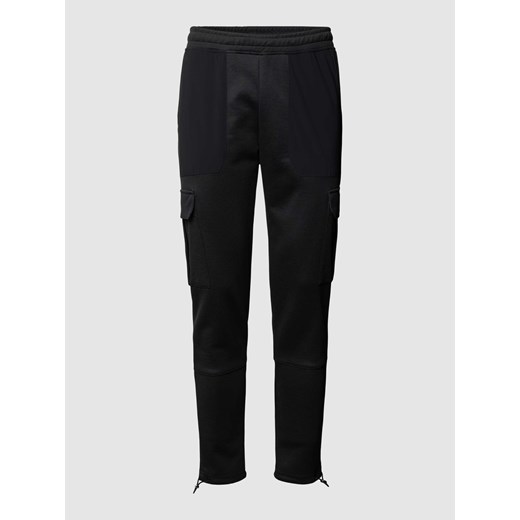 Spodnie dresowe o kroju regular fit z kieszeniami cargo ze sklepu Peek&Cloppenburg  w kategorii Spodnie męskie - zdjęcie 168989412