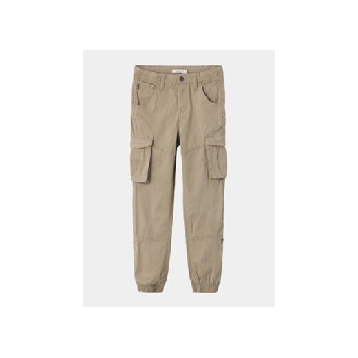 NAME IT Spodnie materiałowe Ryan 13151735 Beżowy Regular Fit ze sklepu MODIVO w kategorii Spodnie chłopięce - zdjęcie 169185624