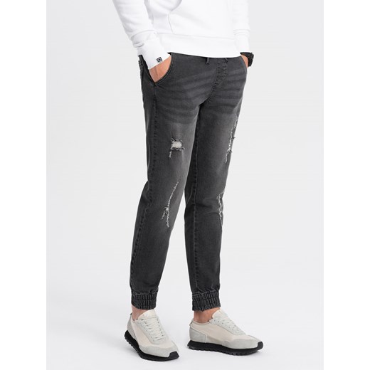 Męskie spodnie jeansowe JOGGERY z przetarciami - czarne V2 OM-PADJ-0150 ze sklepu ombre w kategorii Jeansy męskie - zdjęcie 169399892