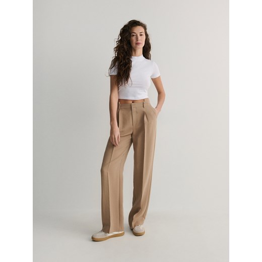 Reserved - Spodnie z kantem - beżowy ze sklepu Reserved w kategorii Spodnie damskie - zdjęcie 169424644