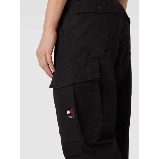 Spodnie cargo z detalem z logo model ‘AIDEN’ Tommy Jeans 34/34 Peek&Cloppenburg 