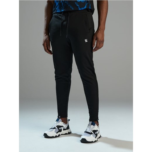 Sinsay - Spodnie dresowe SNSY PERFORMANCE - czarny ze sklepu Sinsay w kategorii Spodnie męskie - zdjęcie 169455871
