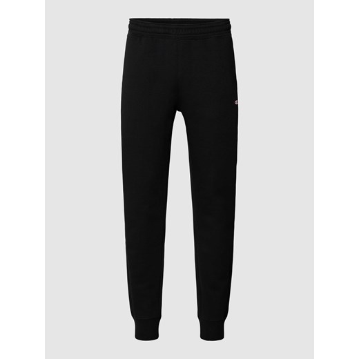 Spodnie dresowe o kroju regular fit z elastycznym pasem ze sklepu Peek&Cloppenburg  w kategorii Spodnie męskie - zdjęcie 169460140