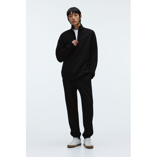 H & M - Spodnie dresowe Regular Fit - Czarny ze sklepu H&M w kategorii Spodnie męskie - zdjęcie 169590400