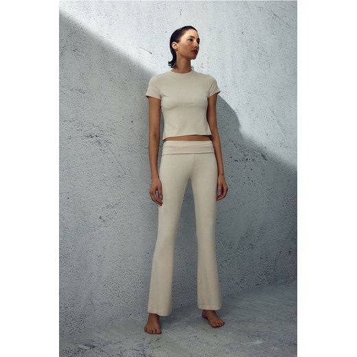 H & M - Rozszerzane spodnie dżersejowe - Beżowy ze sklepu H&M w kategorii Spodnie damskie - zdjęcie 169591591