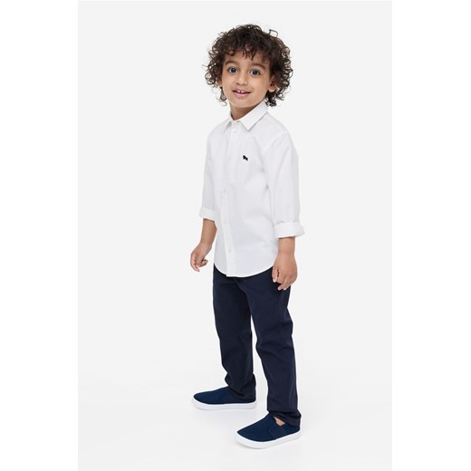 H & M - Spodnie chinos z diagonalu - Niebieski ze sklepu H&M w kategorii Spodnie chłopięce - zdjęcie 169599164