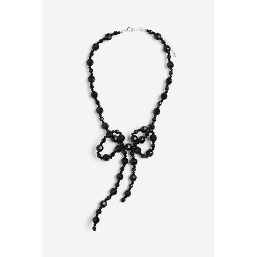 H & M - Koralikowy naszyjnik z kokardą - Czarny ze sklepu H&M w kategorii Biżuteria i zegarki dziecięce - zdjęcie 169599470