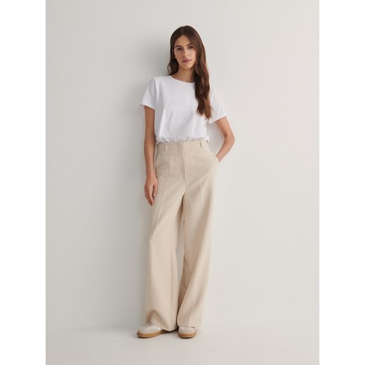 Reserved - Szerokie spodnie z kantem - beżowy ze sklepu Reserved w kategorii Spodnie damskie - zdjęcie 169640123