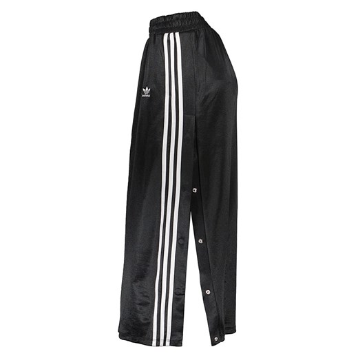 Spódnica Adidas z bawełny midi w sportowym stylu