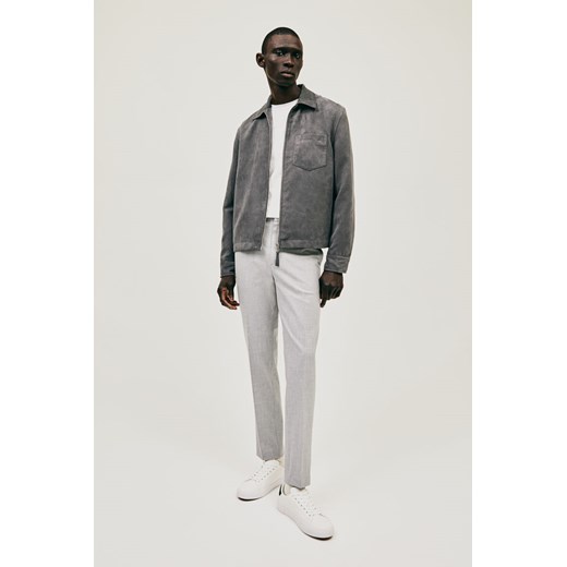 H & M - Spodnie Slim Fit - Szary ze sklepu H&M w kategorii Spodnie męskie - zdjęcie 169676362