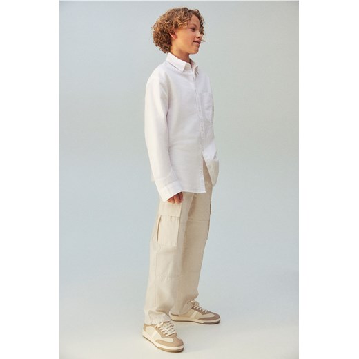 H & M - Bawełniane spodnie cargo - Beżowy ze sklepu H&M w kategorii Spodnie chłopięce - zdjęcie 169677544