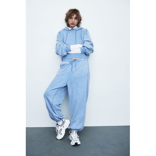 H & M - Joggersy o spranym wyglądzie - Niebieski ze sklepu H&M w kategorii Spodnie damskie - zdjęcie 169678960