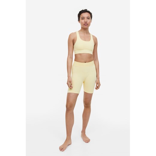 H & M - Krótkie legginsy bezszwowe DryMove - Żółty ze sklepu H&M w kategorii Szorty - zdjęcie 169679232
