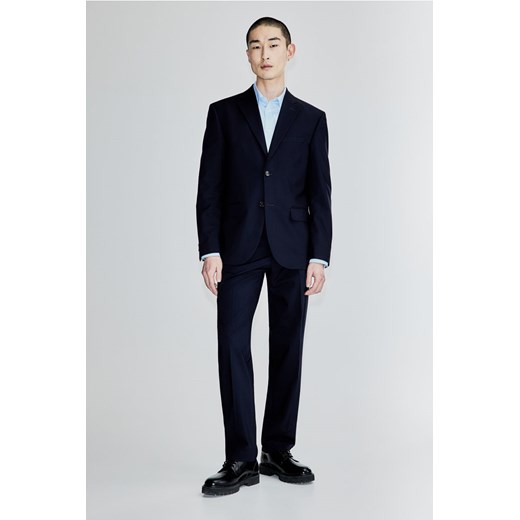 H & M - Spodnie garniturowe Regular Fit - Niebieski ze sklepu H&M w kategorii Spodnie męskie - zdjęcie 169679292