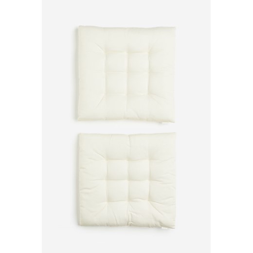 H & M - Bawełniana poduszka na krzesło 2-pak - Biały ze sklepu H&M w kategorii Tekstylia ogrodowe - zdjęcie 169679572