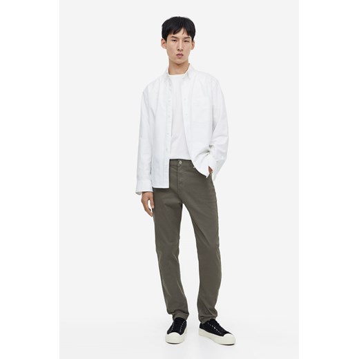 H & M - Spodnie z bawełnianego diagonalu Slim Fit - Zielony ze sklepu H&M w kategorii Spodnie męskie - zdjęcie 169682664