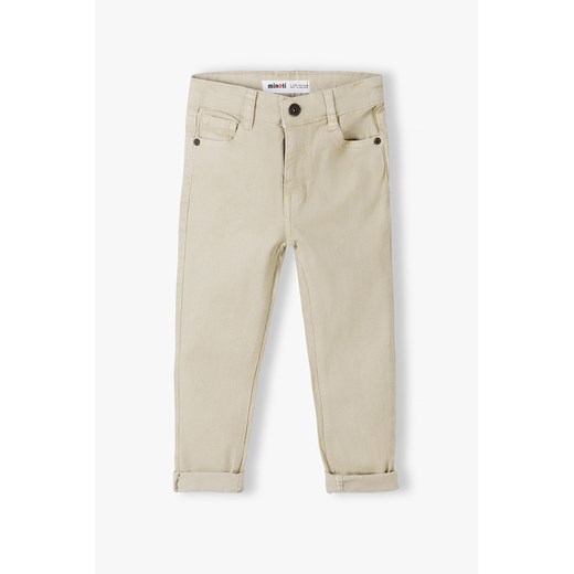 Beżowe spodnie z bawełny dla chłopca ze sklepu 5.10.15 w kategorii Spodnie chłopięce - zdjęcie 169685224