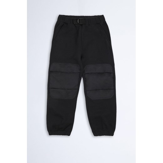 Spodnie ze wzmacnianymi kolanami - czarne - unisex - Limited Edition ze sklepu 5.10.15 w kategorii Spodnie chłopięce - zdjęcie 169687433