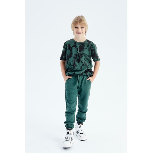 Zielone spodnie dresowe dla chłopca ze sklepu 5.10.15 w kategorii Spodnie chłopięce - zdjęcie 169688640