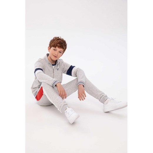 Szare spodnie dresowe dla chłopca ze sklepu 5.10.15 w kategorii Spodnie chłopięce - zdjęcie 169690704