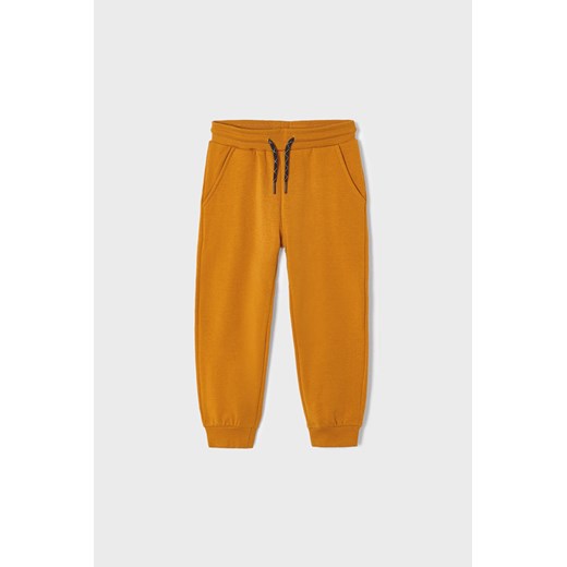 Pomarańczowe spodnie dresowe chłopięce ze sklepu 5.10.15 w kategorii Spodnie chłopięce - zdjęcie 169692933