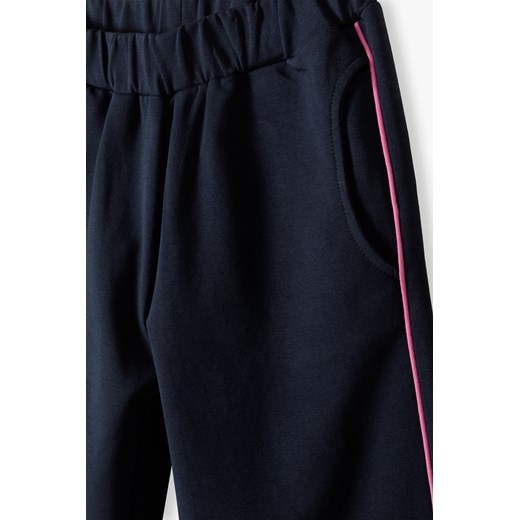 Spodnie dresowe dla dziewczynki z różowymi lampasami Lincoln & Sharks By 5.10.15. 134 5.10.15