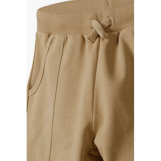 Spodnie dresowe regular z miękkiej dzianiny - beżowe z kieszeniami 5.10.15. 110 5.10.15