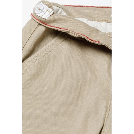 Beżowe spodnie niemowlęce typu chinosy z bawełny Minoti 80/86 5.10.15