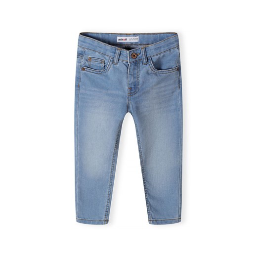 Klasyczne spodnie jeansowe dopasowane dla niemowlaka ze sklepu 5.10.15 w kategorii Spodnie i półśpiochy - zdjęcie 169703120