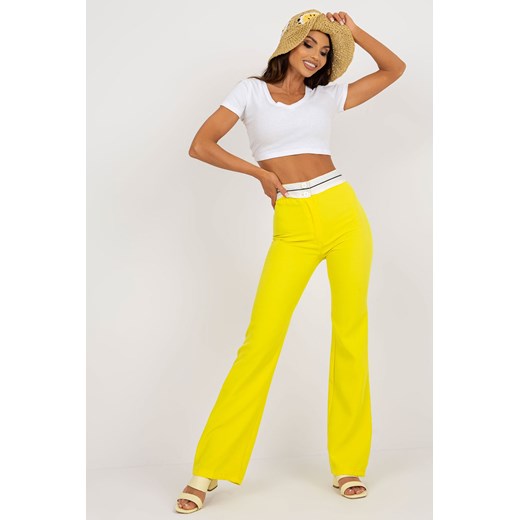 Żółte garniturowe spodnie z materiału w kant ze sklepu 5.10.15 w kategorii Spodnie damskie - zdjęcie 169703270