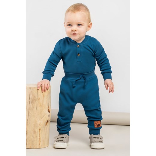 Niebieskie spodnie bawełniane dla niemowlaka ze sklepu 5.10.15 w kategorii Spodnie i półśpiochy - zdjęcie 169704910