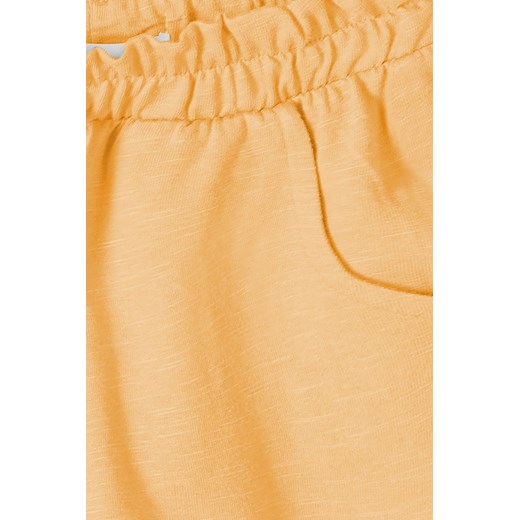 Pomarańczowe szorty dresowe dla niemowlaka z bawełny Minoti 92/98 5.10.15