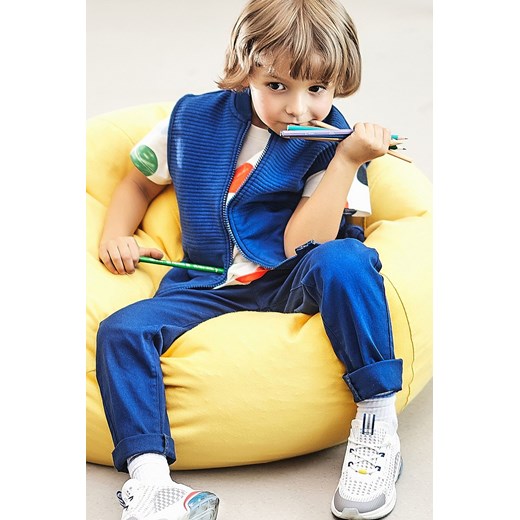 Granatowe klasyczne spodnie slim fit dla chłopca ze sklepu 5.10.15 w kategorii Spodnie chłopięce - zdjęcie 169707883