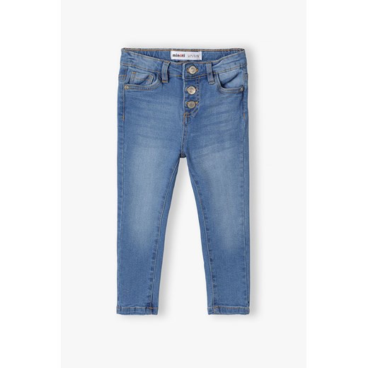 Spodnie jeansowe skinny dla dziewczynki - niebieskie ze sklepu 5.10.15 w kategorii Spodnie dziewczęce - zdjęcie 169709212