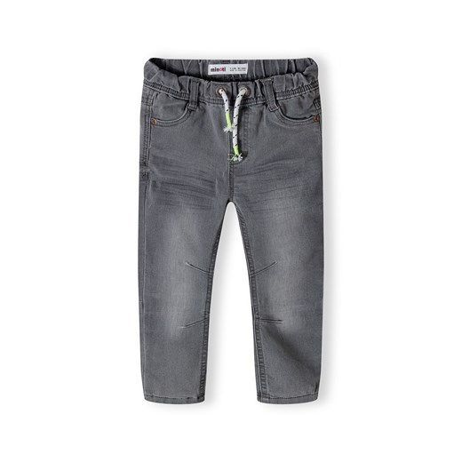Szare jeansy ze ściągaczem oraz lekkimi przetarciami niemowlęce ze sklepu 5.10.15 w kategorii Spodnie i półśpiochy - zdjęcie 169709474