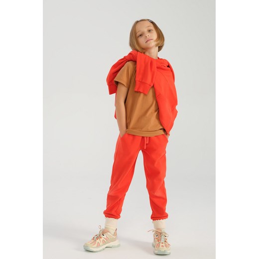Pomarańczowe spodnie dresowe - unisex - Limited Edition ze sklepu 5.10.15 w kategorii Spodnie chłopięce - zdjęcie 169710864