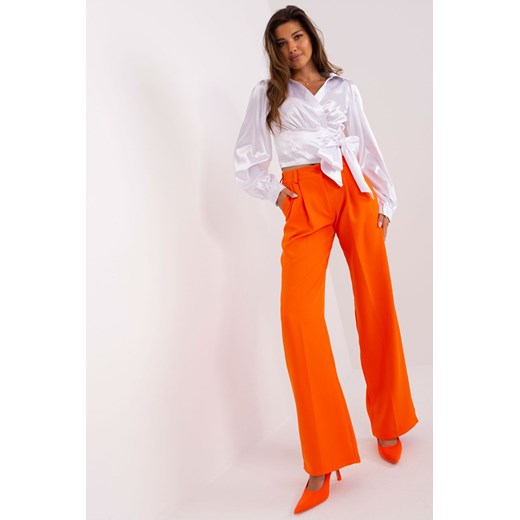 Pomarańczowe garniturowe spodnie z kieszeniami Lakerta 36 5.10.15